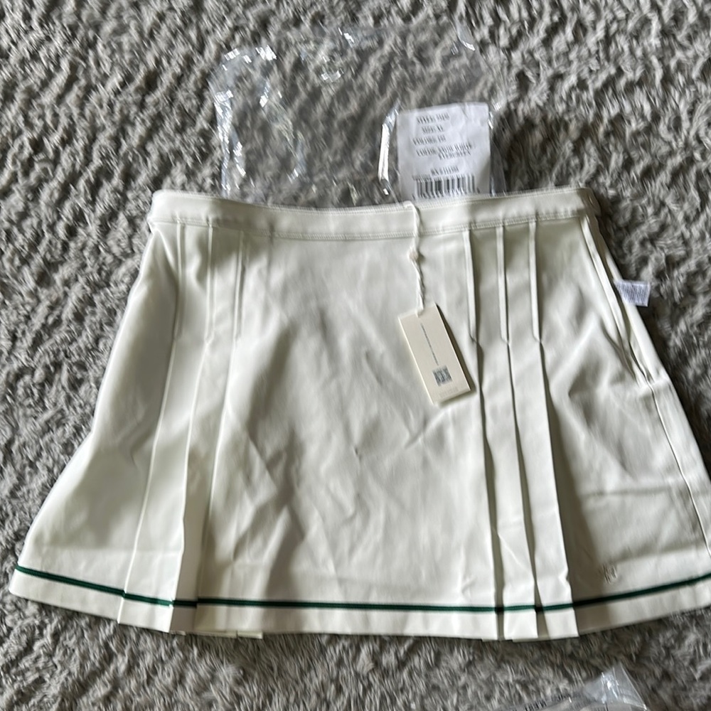 Tory Sport Cream Skater Skirt with Pleated Mini Design